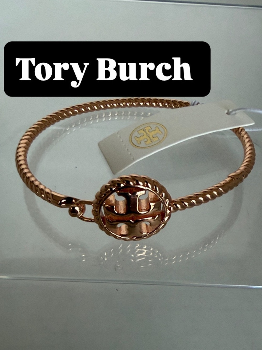 Tory Burch Rose Gold Twisted Logo Bangle Bracelet
